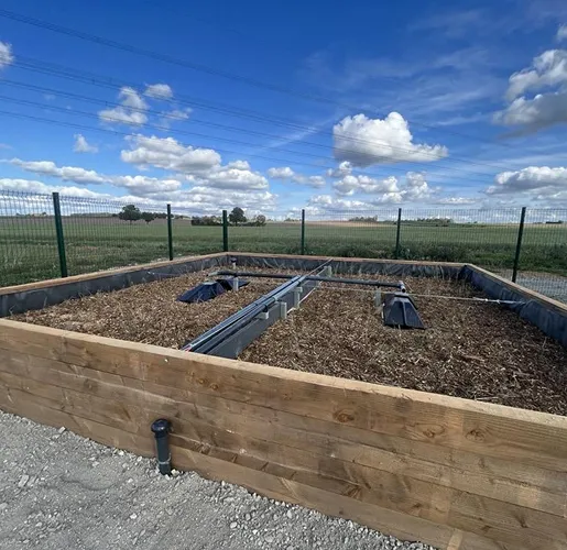 Jardin d'assainissement par phytoépuration réalisé par Bigot TP